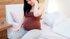 Как да намалите болките в гърба през бременността?