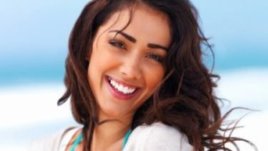 Усмивката прави жената красива