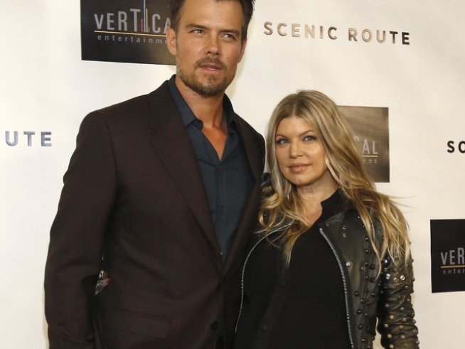 Фърги и Джош малко преди певицата да роди Снимка: Reuters