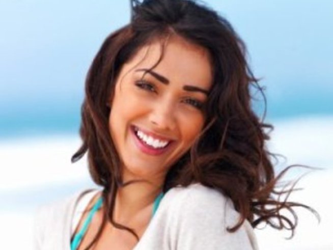 Усмивката прави жената красива